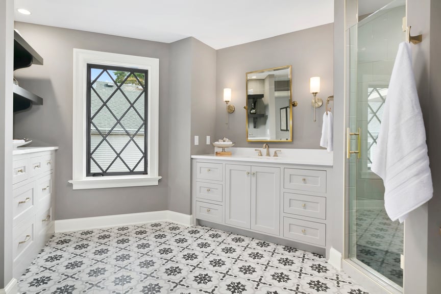 Decorative tile flooring in master bathroom